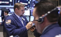 Wall Street cierra con ganancias y el Nasdaq logra un nuevo r&eacute;cord